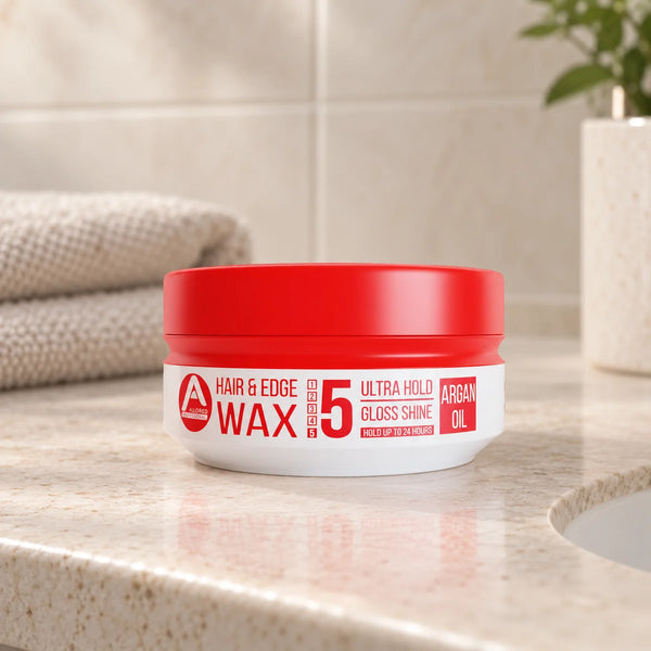 Allored Professional Argan Oil Hair & Edge Wax — 150 ml on a bathroom vanity.