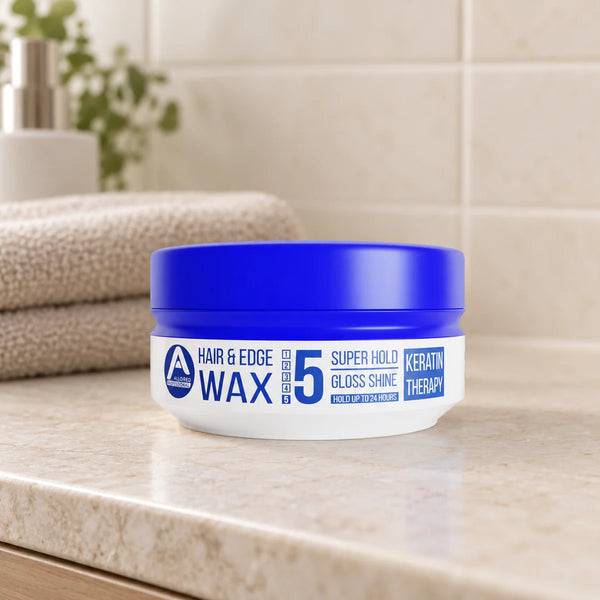 Allored Professional Keratin Therapy Hair & Edge Wax — 150 ml on a bathroom vanity.