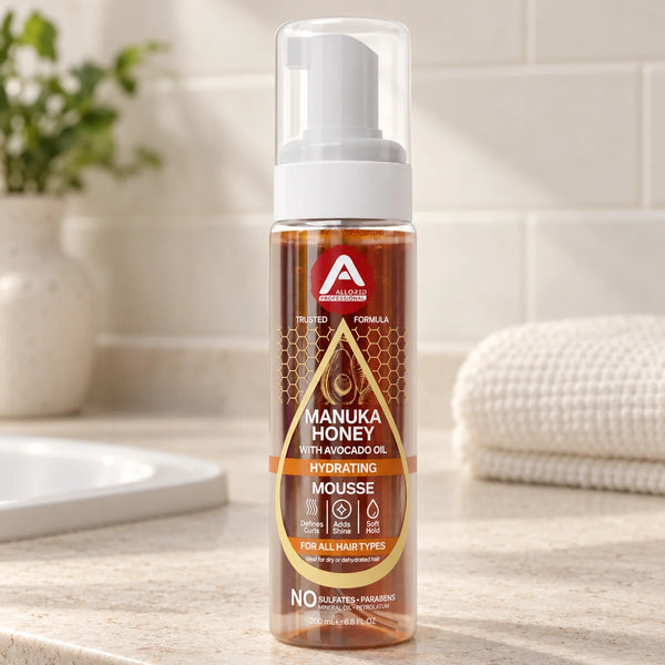 Allored Professional Manuka Honey & Avocado Oil Hydrating Mousse for Dry Hair — 200 ml on a bathroom vanity.