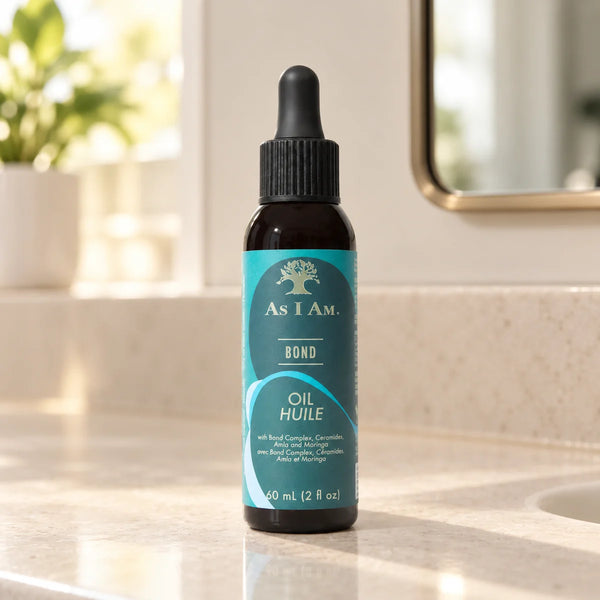 As I Am Bond Repair Hair Oil Strengthening Shine for Damaged Hair — 60 ml on a bathroom vanity.