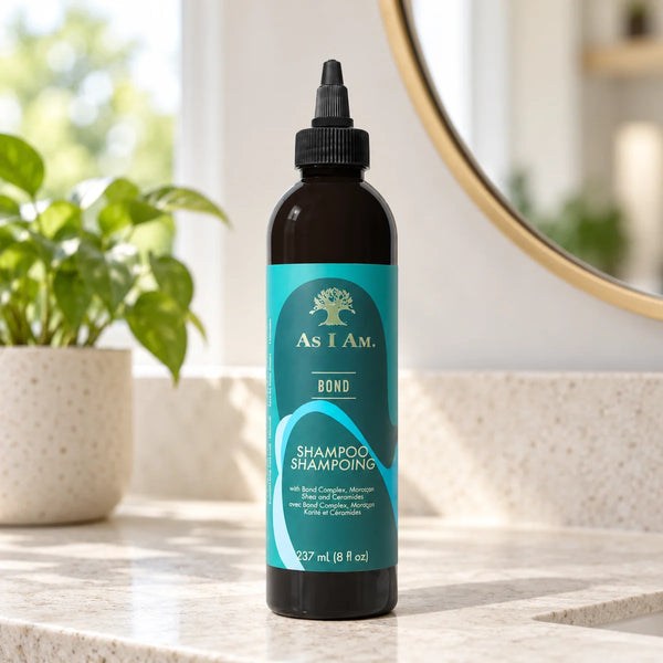 As I Am Bond Shampoo Gentle Strengthening Cleanse for Damaged Hair — 237 ml on a bathroom vanity.