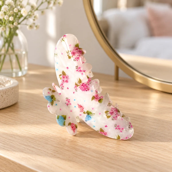 Reverie Hair Aster Hair Clip — Aster floral hair clip on a dressing table.