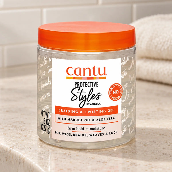 Cantu Protective Styles Braiding & Twisting Gel — 8 oz on a bathroom vanity.