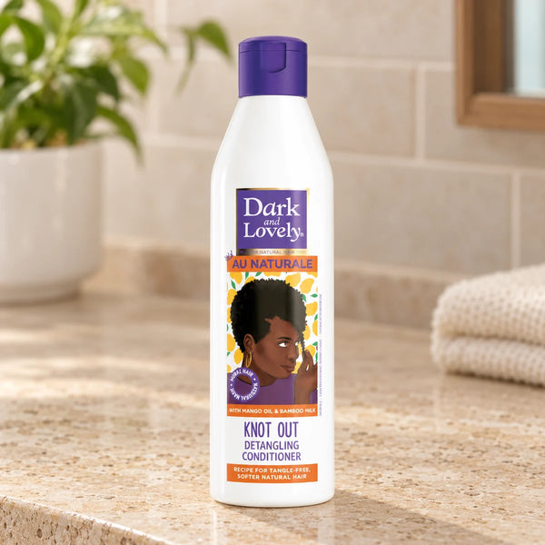 Dark and Lovely Au Naturale Knot Out Detangling Conditioner 8.5oz For Natural Hair — 8.5 oz on a bathroom vanity.