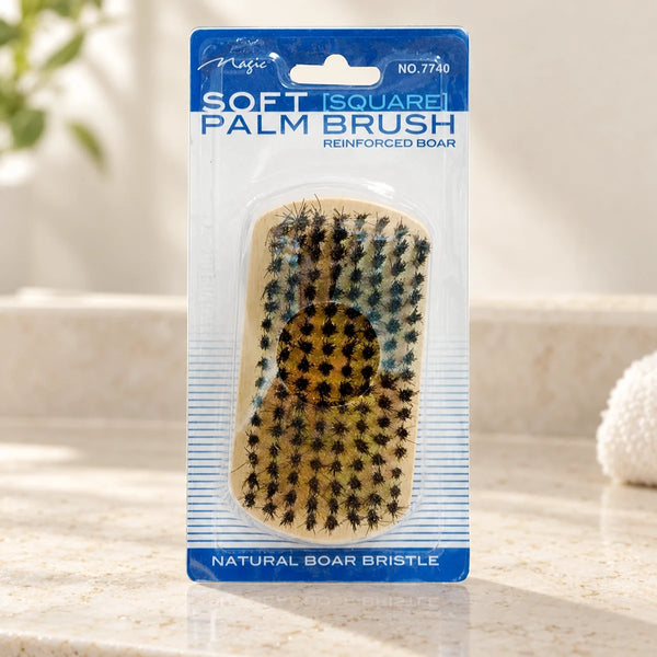 Magic Collection Soft Palm Brush - Square (No.7740) Gentle Detangling & Styling for All Hair Types on a bathroom vanity or dressing table.