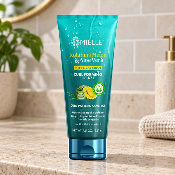 Mielle Kalahari Melon & Aloe Vera Deep Hydration Curl Forming Glaze — 221 g on a bathroom vanity.