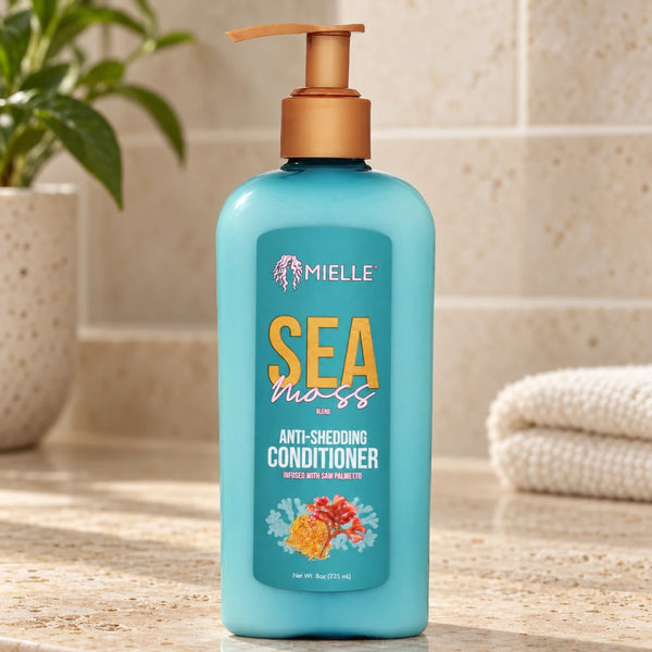 Mielle Sea Moss Conditioner — 8 oz on a bathroom vanity.