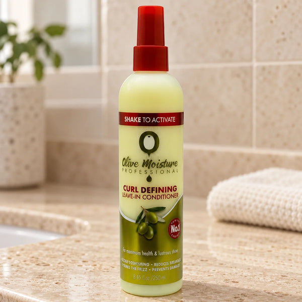 Olive Moisture Curl Defining Leave-In Conditioner for Frizz-Free, Hydrated Curls — 250 ml on a bathroom vanity.