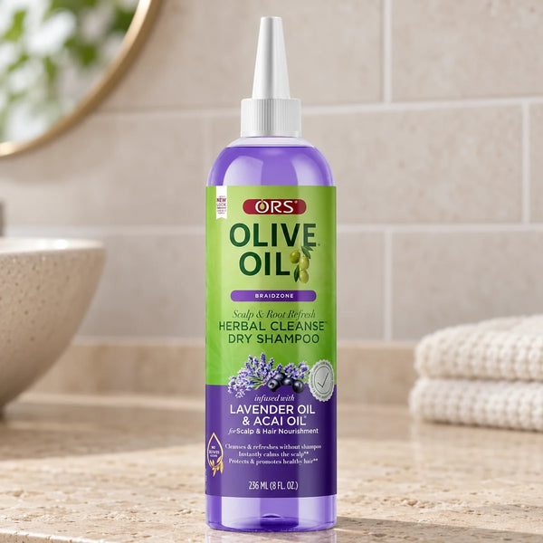 ORS Olive Oil Braidzone Scalp & Root Refresh Herbal Cleanse Dry Shampoo — 236 ml on a bathroom vanity.
