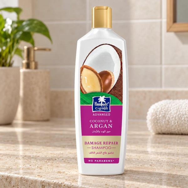 Parachute Advansed Coconut & Argan Damage Repair Shampoo — 340 ml on a bathroom vanity.