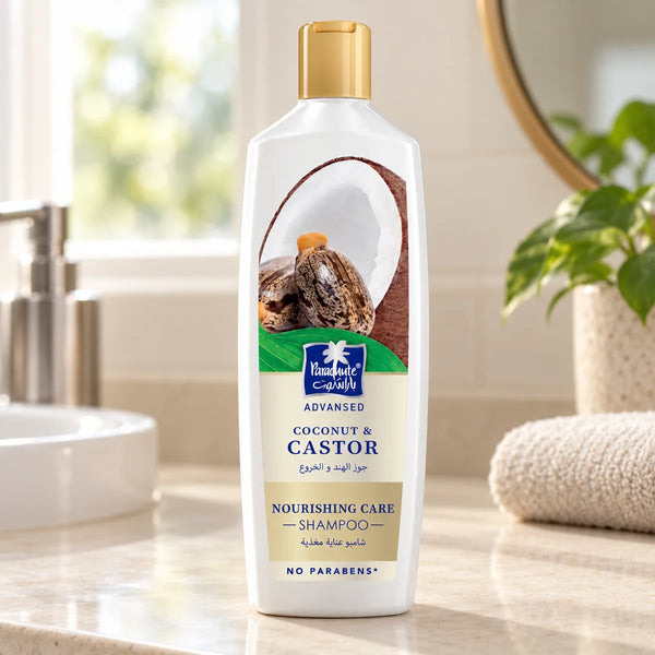 Parachute Advansed Coconut & Castor Nourishing Care Shampoo — 340 ml on a bathroom vanity.