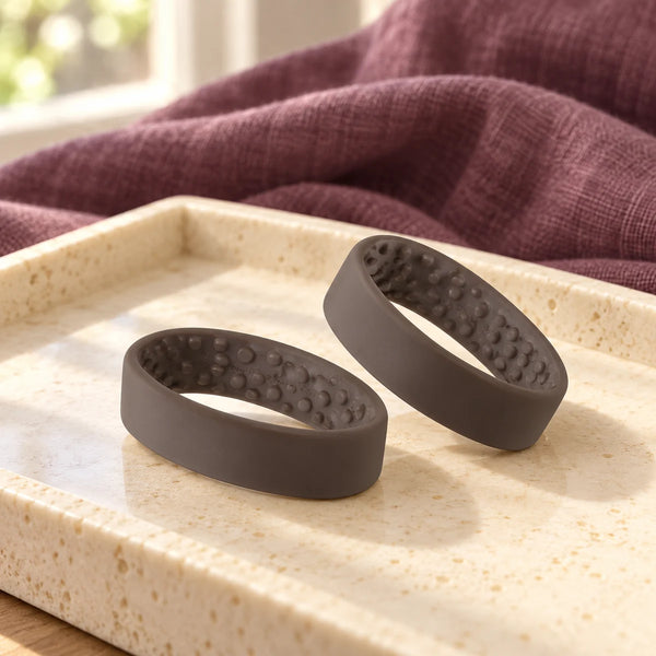PONY-O Medium Hair Fasteners — Pack of 2 — Brown/Brown on a dressing-table tray.