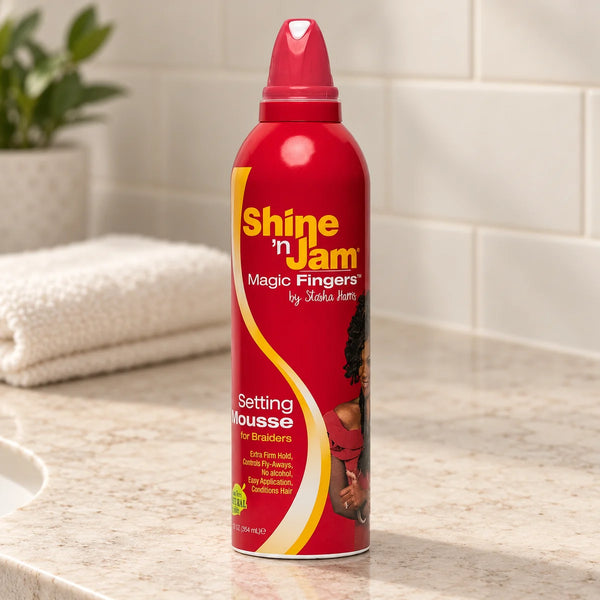 Shine 'n Jam Magic Fingers Setting Mousse Long-Lasting Hold & Professional Braids for Braiders — 12 oz on a bathroom vanity.