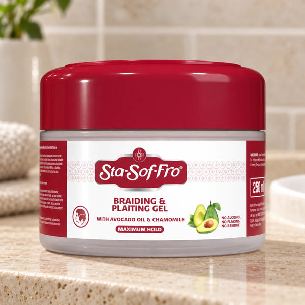 Sta Sof Fro Avocado Oil & Chamomile Braiding & Plaiting Gel - Smooth, Frizz-Free Hold & Shine for Braids & Plaits — 250 ml on a bathroom vanity.
