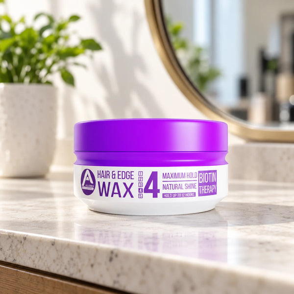 Allored Professional Biotin Therapy Hair & Edge Wax — 150 ml on a bathroom vanity.