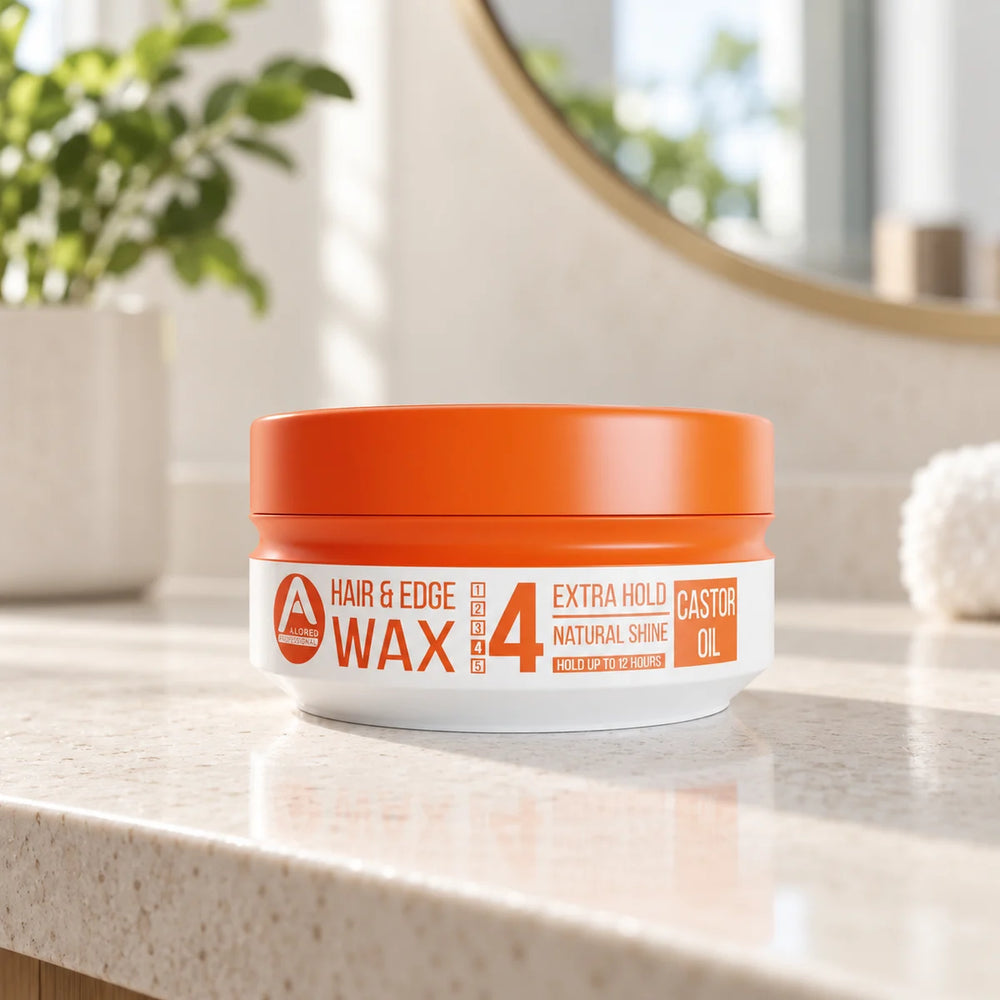 Allored Professional Castor Oil Hair & Edge Wax — 150 ml on a bathroom vanity.