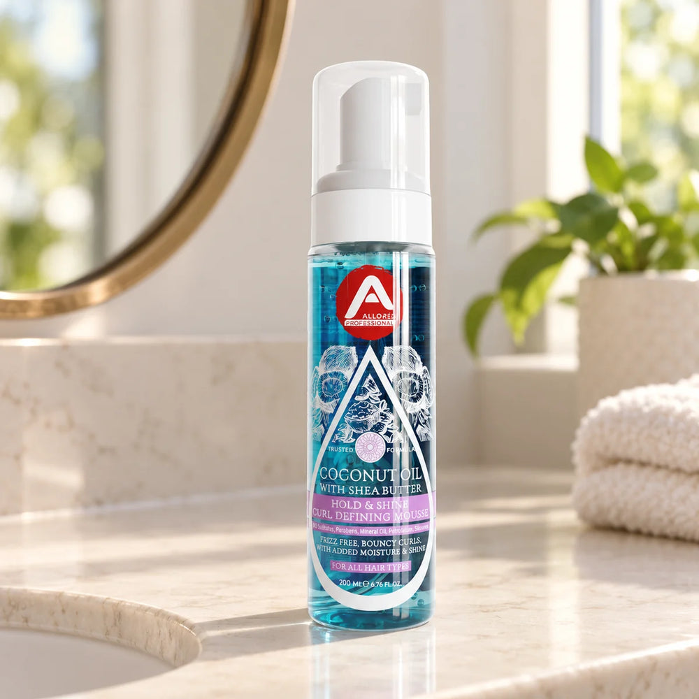 Allored Professional Coconut Oil & Shea Butter Curl Defining Mousse for All Hair Types — 200 ml on a bathroom vanity.