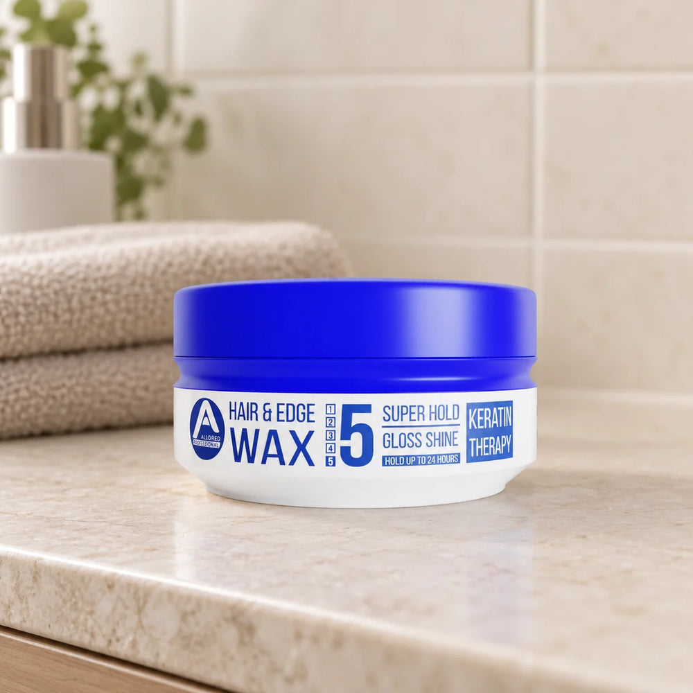 Allored Professional Keratin Therapy Hair & Edge Wax — 150 ml on a bathroom vanity.