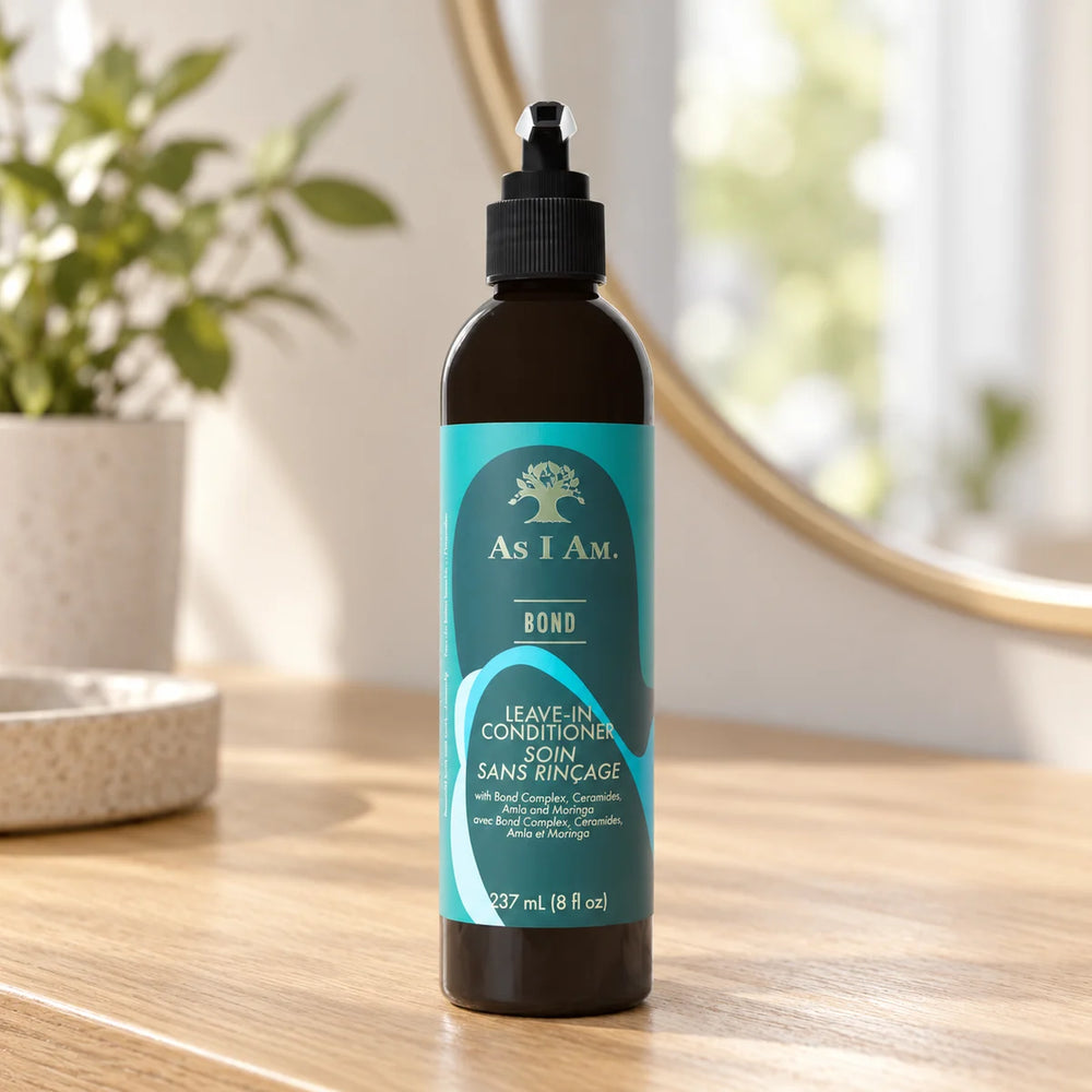 As I Am Bond Leave-In Conditioner — 237 ml on a bathroom vanity.