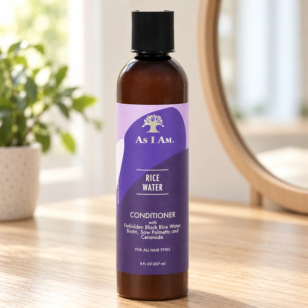 As I Am Rice Water Conditioner Strengthening & Hydrating for Curly, Coily & Wavy Hair — 8 oz on a bathroom vanity.