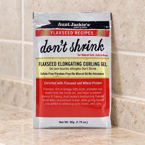 Aunt Jackie's Flaxseed Don’t Shrink Elongating Curling Gel — 50 g on a bathroom vanity.