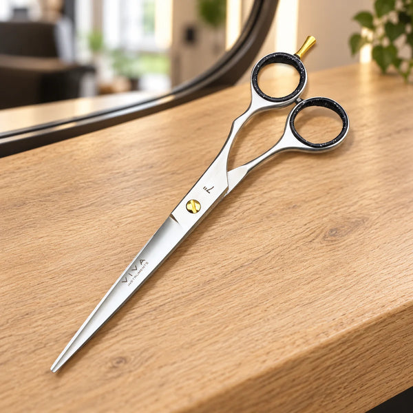 Silver Viva 7-inch hairdressing scissors on a salon worktop.