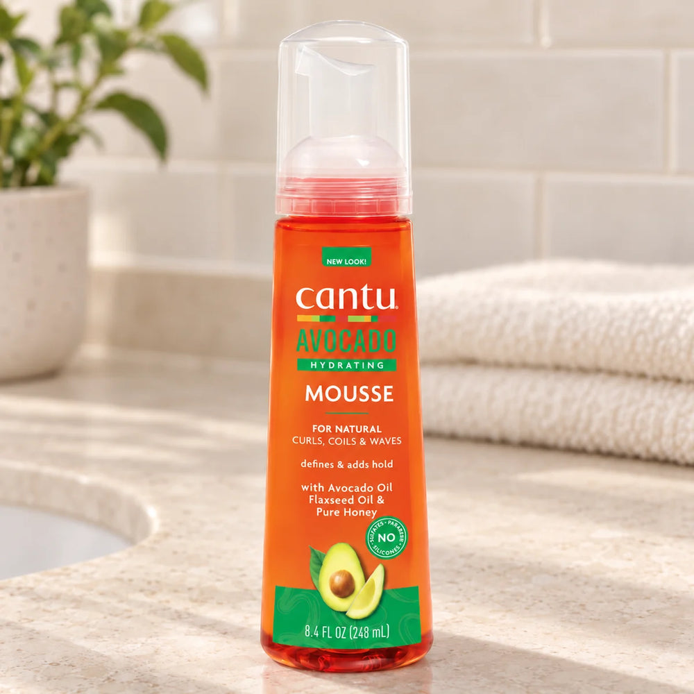 Cantu Avocado Mousse — 248 ml on a bathroom vanity.