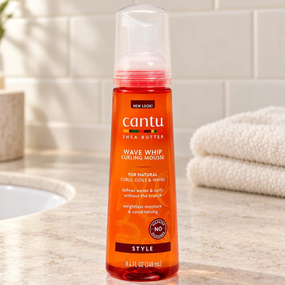 Cantu Wave Whip Curling Mousse — 248 ml on a bathroom vanity.