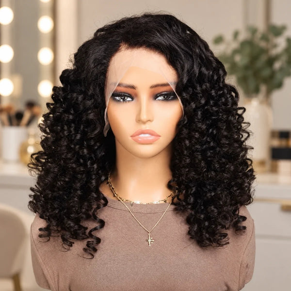 Chic Luxe Hair Glueless Funmi Spiral Curly Full Lace Front Long Wig, shown on its original subject against a neutral dressing-room background.