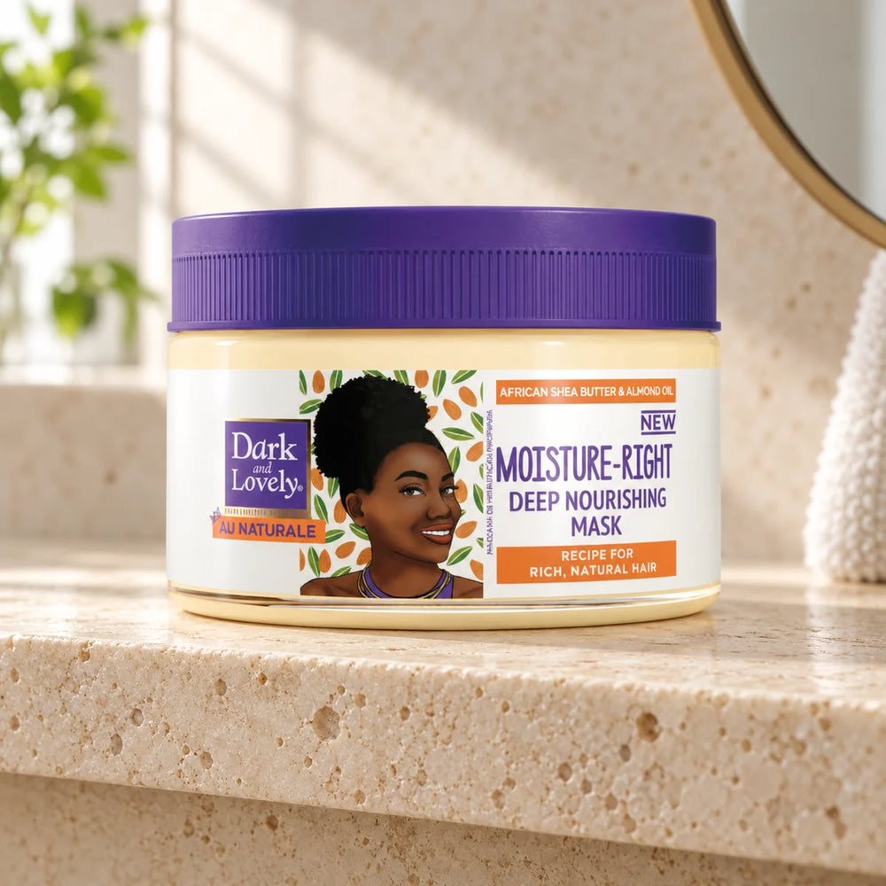 Dark and Lovely Au Naturale Moisture Right Deep Nourishing Mask 8.5oz For Dry Hair — 8.5 oz on a bathroom vanity or dressing table.