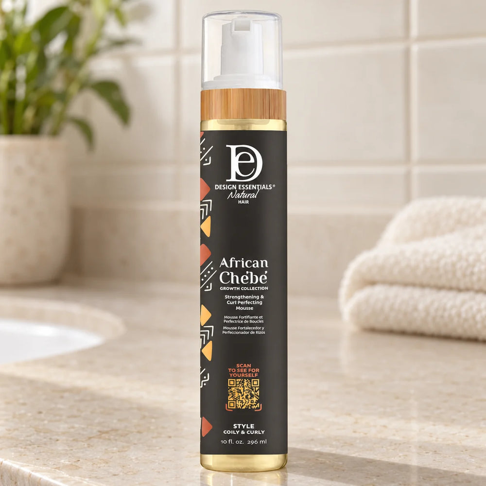 Design Essentials African Chebe Strengthening & Curl Perfecting Mousse — 10 oz on a bathroom vanity.