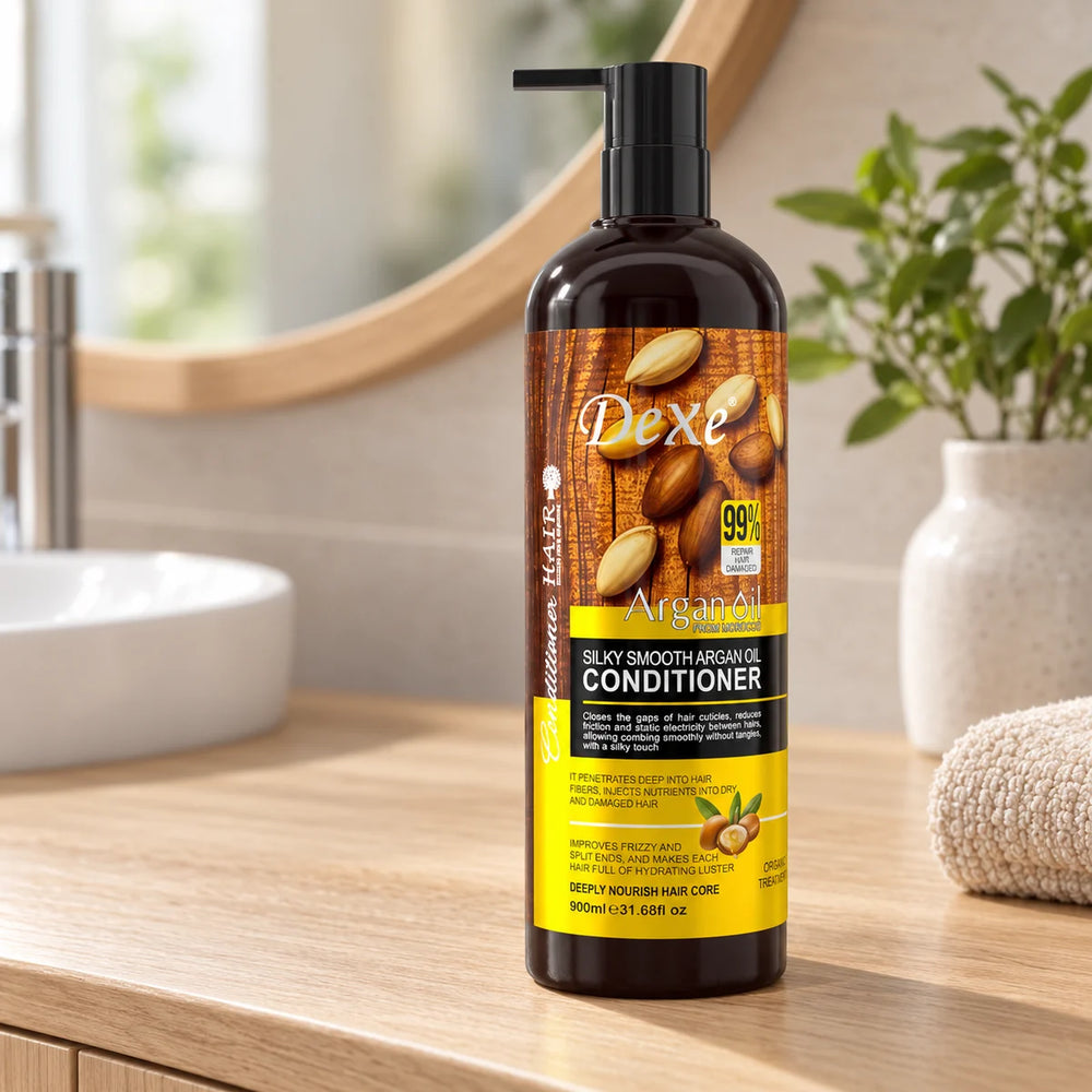 Dexe Silky Smooth Argan Oil Conditioner — 900 ml on a bathroom vanity.