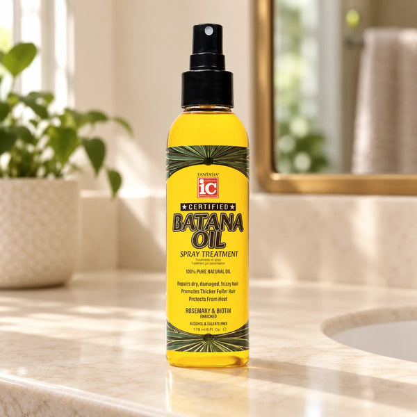 Fantasia IC Batana Oil Spray Treatment — 178 ml on a bathroom vanity.