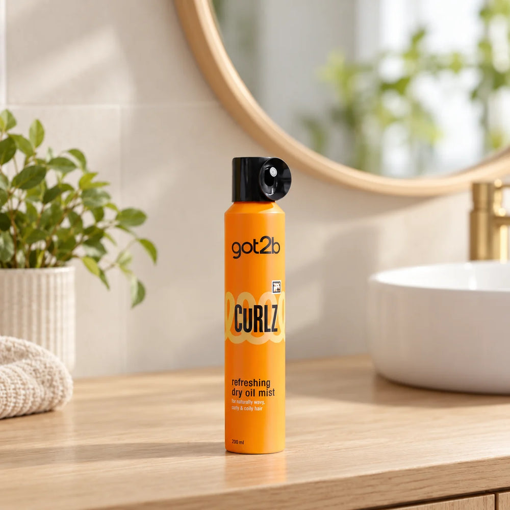 got2b Curlz Refreshing Dry Oil Mist — 200 ml on a bathroom vanity.