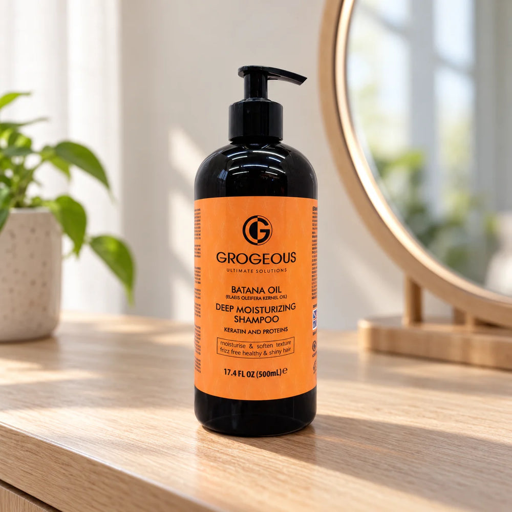 Grogeous Batana Oil Deep Moisturizing Shampoo Hydration & Frizz Control — 500 ml on a bathroom vanity.