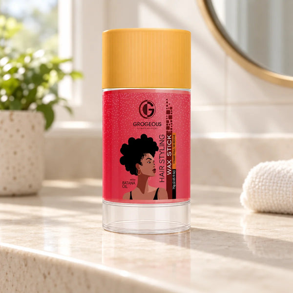 Grogeous Batana Oil Hair Styling Wax Stick — 75 g on a bathroom vanity.