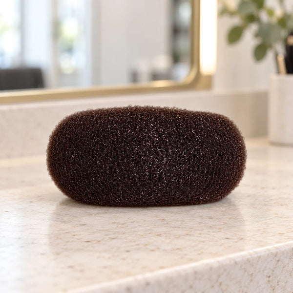 Hair Tools Bun Ring - Jumbo — Brown jumbo bun ring on a salon counter.