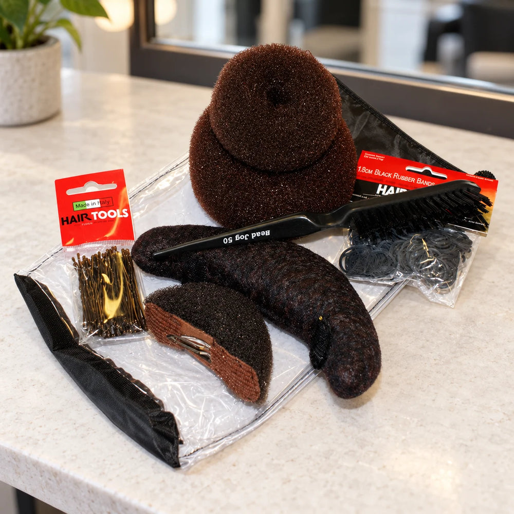 Hair Tools Updo Kit - Dark — Hair Tools Updo Kit Dark with its styling accessories beside a salon mirror.