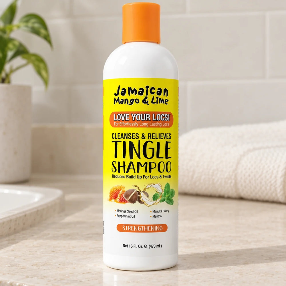 Jamaican Mango & Lime Tingle Shampoo — 16 oz on a bathroom vanity.