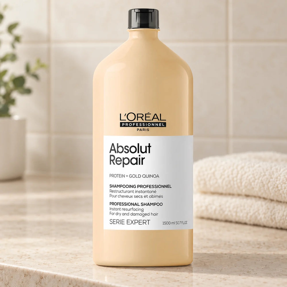 L'Oréal Professionnel Serié Expert Absolut Repair Shampoo for Intense Damage Repair & Nourishment for Dry & Damaged Hair — 1500 ml on a bathroom vanity.