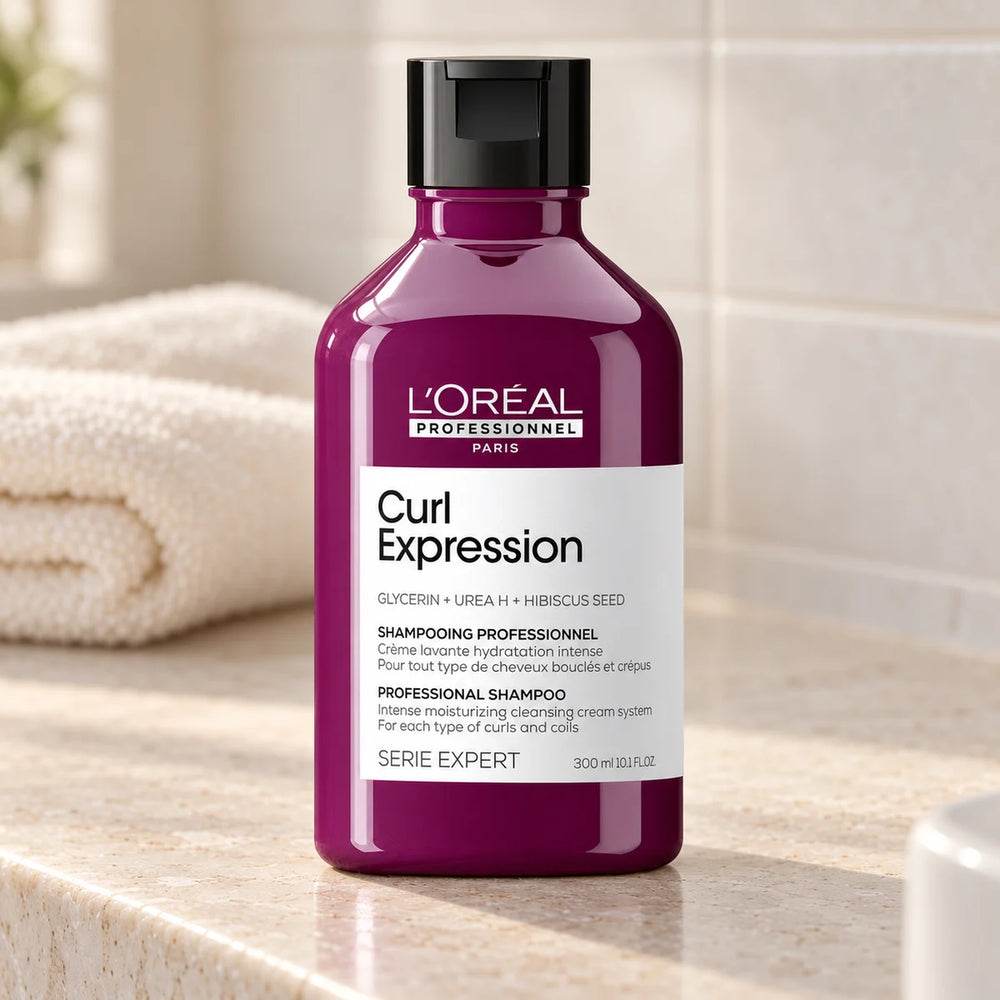 L'Oréal Professionnel Serié Expert Curl Expression Shampoo for Intense — 300 ml on a bathroom vanity.