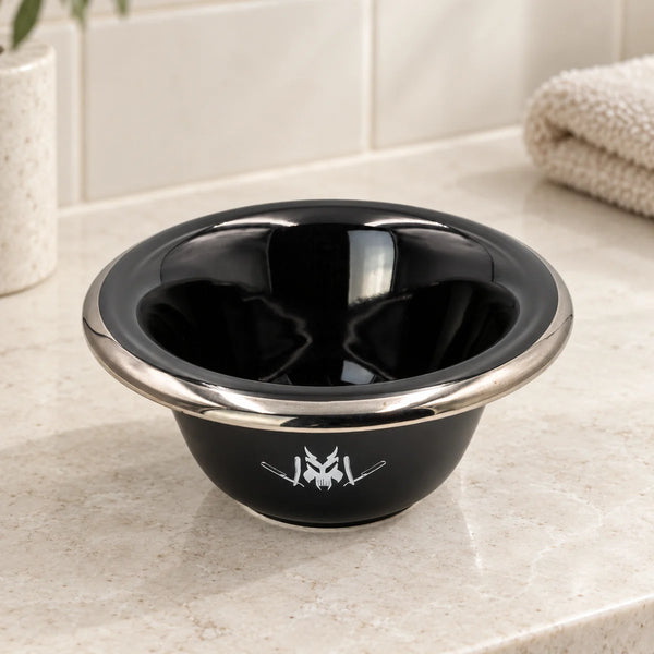Black Barbarossa ceramic shaving bowl on a bathroom vanity.