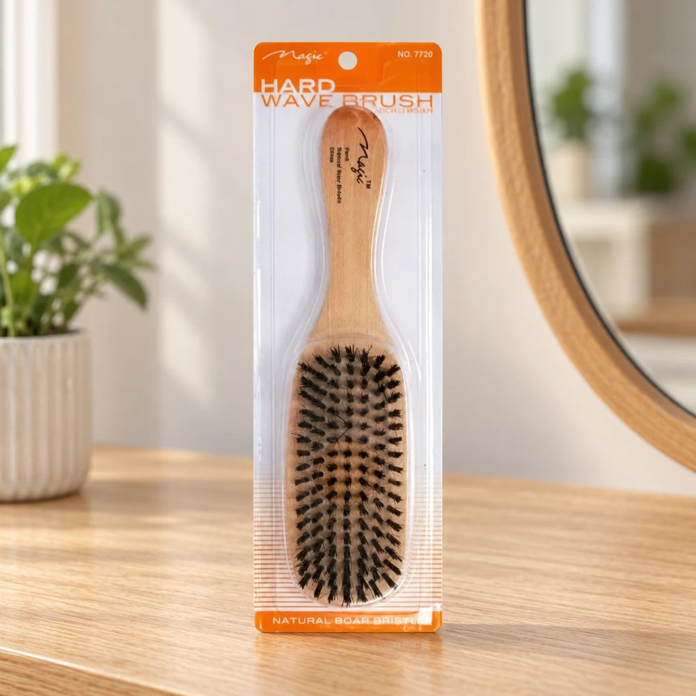 Magic Collection Hard Wave Brush (No.7720) for Deep, Defined Waves & Superior Styling on a bathroom vanity or dressing table.