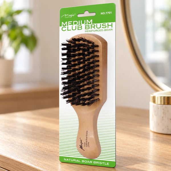 Magic Collection Medium Club Brush (No.7701) for Smooth Styling & Scalp Stimulation, Medium on a bathroom vanity or dressing table.