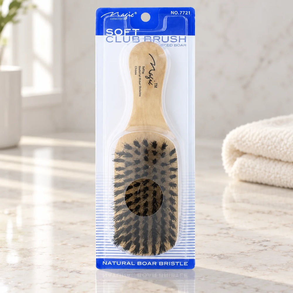 Magic Collection Soft Club Brush (No.7721) for Gentle Detangling & Smooth Styling on a bathroom vanity or dressing table.