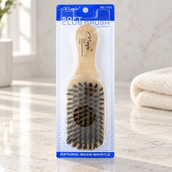 Magic Collection Soft Club Brush (No.7721) for Gentle Detangling & Smooth Styling on a bathroom vanity or dressing table.