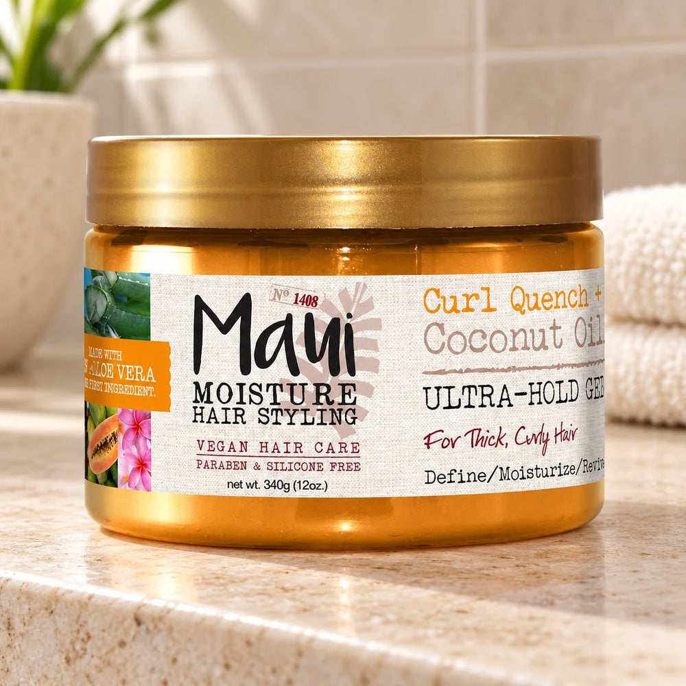Maui Moisture Curl Quench + Coconut Oil Ultra-Hold Gel — 340 g on a bathroom vanity.