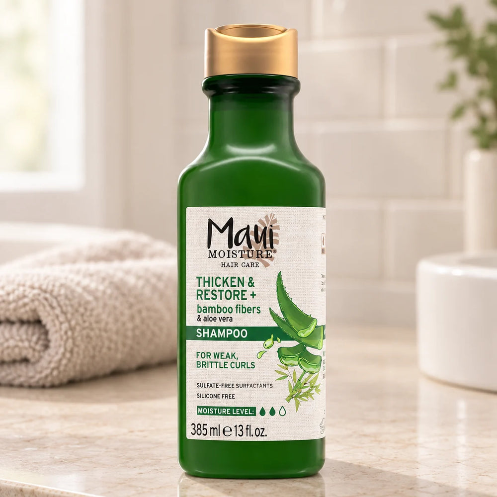 Maui Moisture Thicken & Restore + Bamboo Fiber Shampoo — 385 ml on a bathroom vanity.