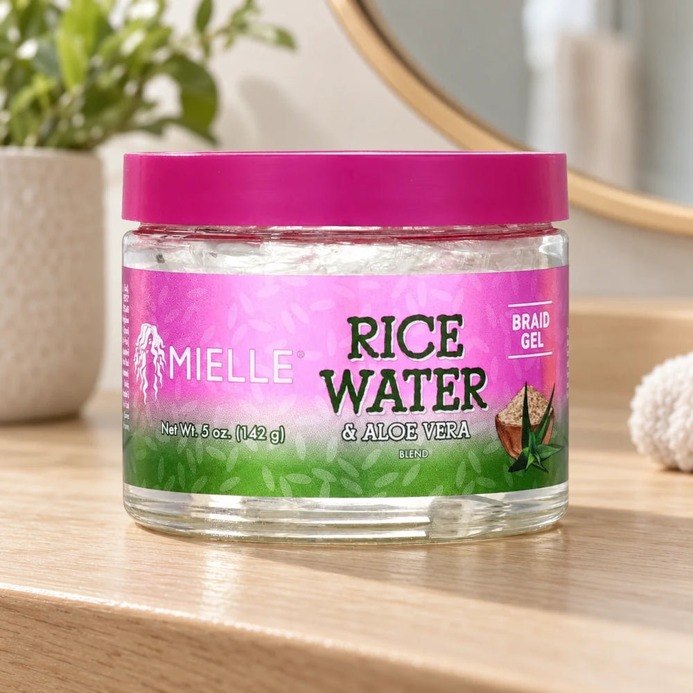 Mielle Rice Water & Aloe Braid Gel — 5 oz on a bathroom vanity.