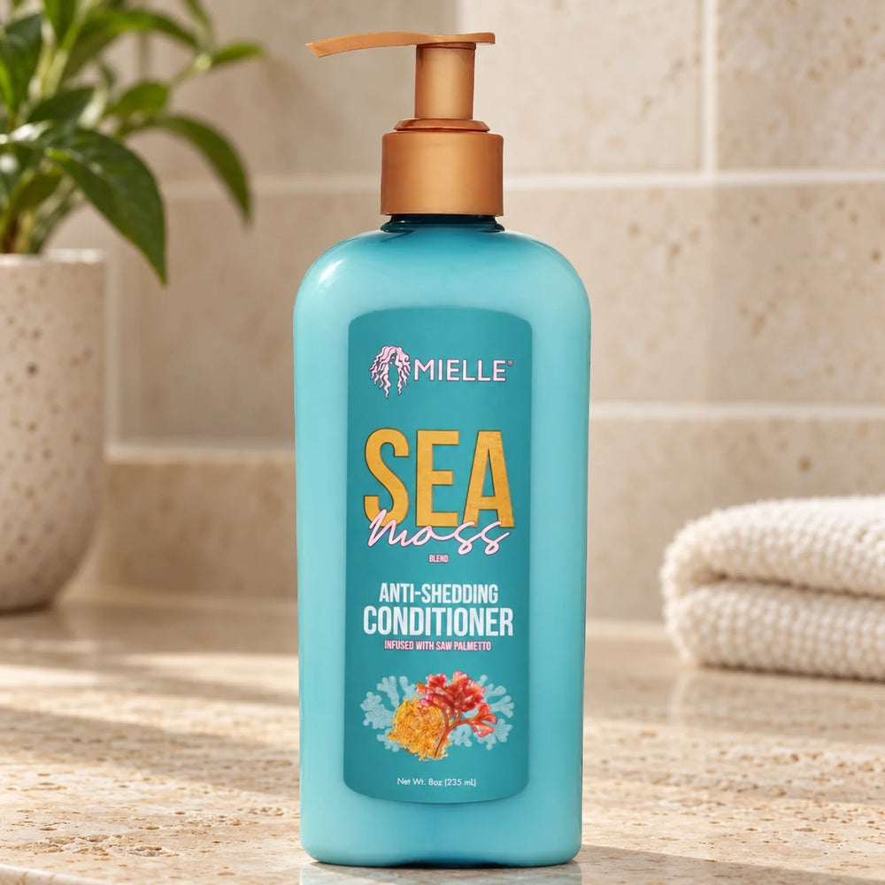 Mielle Sea Moss Conditioner — 8 oz on a bathroom vanity.